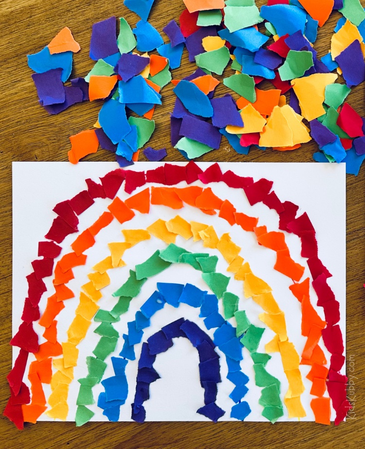 Are you looking for a fun rainy day activity? Bring the outdoors inside with this easy and cheap rainbow craft for kids. With just a few basic supplies including construction paper, glue and markers, your kids can make the prettiest torn paper rainbow craft ever! This boredom busting activity is simple to set up but will keep kids entertained as they fill in the colors of the rainbow. Make this a learning activity for preschoolers by asking what colors they are using for each line of their rainbows. What a great way for kids to learn their colors!