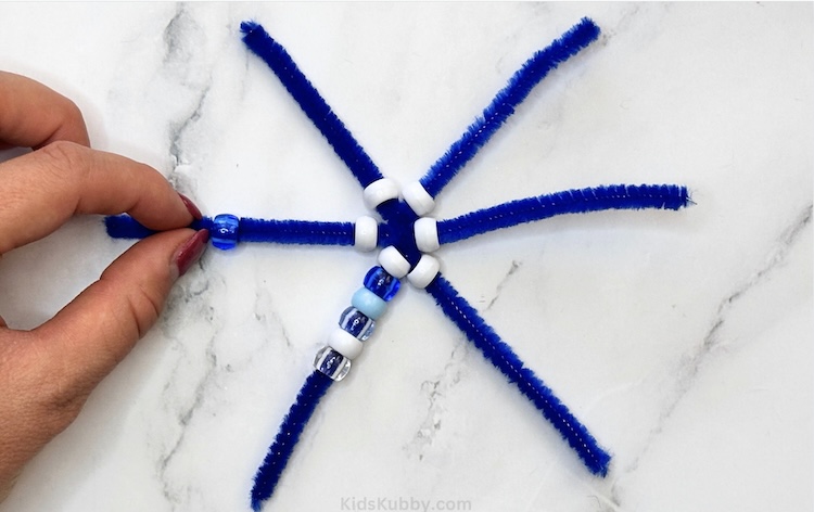 Beaded Pipe Cleaner Snowflakes - One Little Project