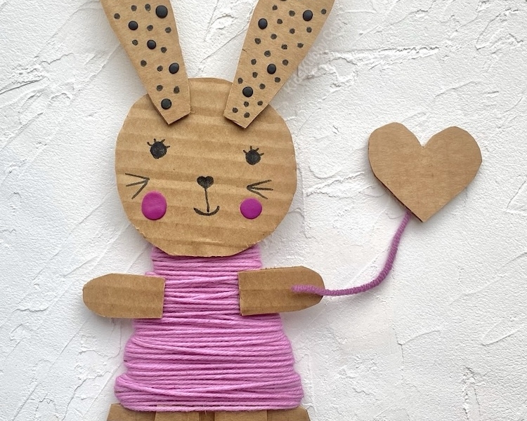 Cute craft idea for kids! Try making these adorable bunnies out of cheap recycled materials including cardboard, yarn, and markers. Super fun for children of all ages. They are fun to play with as well as decorate your home during spring or Easter.