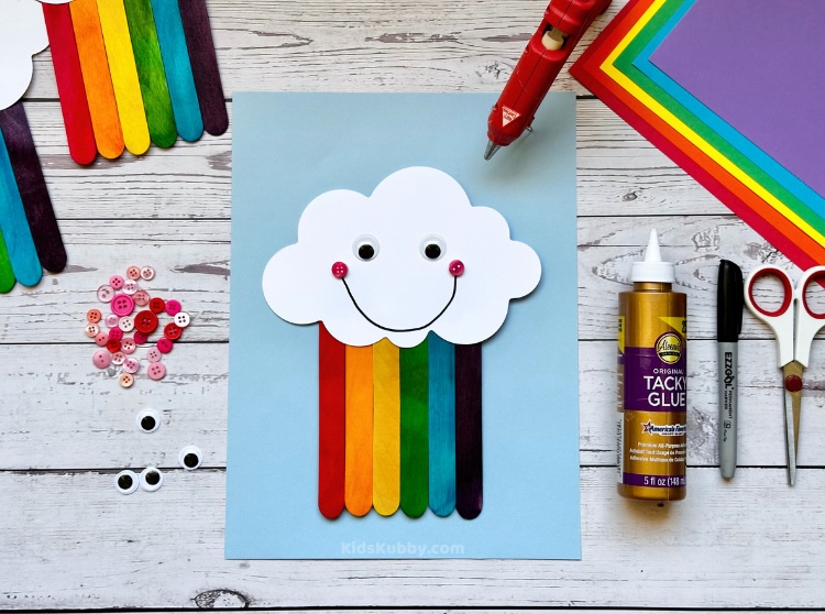 how cute is this cloud and rainbow craft?! create this easy and fun popsicle stick art project in just 5 minutes. a great indoor activity for kids of all ages. 