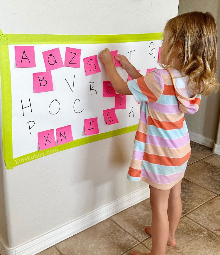 Are you looking for a fun indoor activity for kids? With just a few cheap supplies you have at home, you can make this ABC learning game that is sure to keep kids entertained for hours! Plus, everyone young and old loves post-it notes so you can't go wrong!