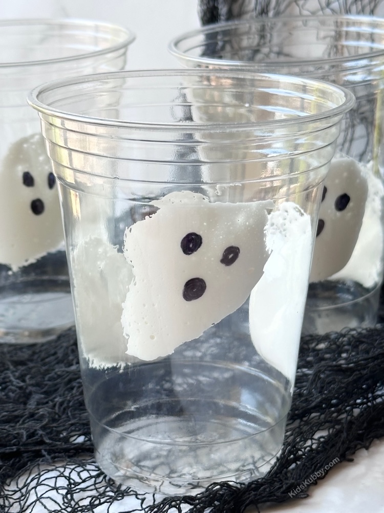 Use marshmallow fluff to make ghost shapes on a clear plastic cup. Pour in chocolate milk and create a fun spooky drink for kids. 