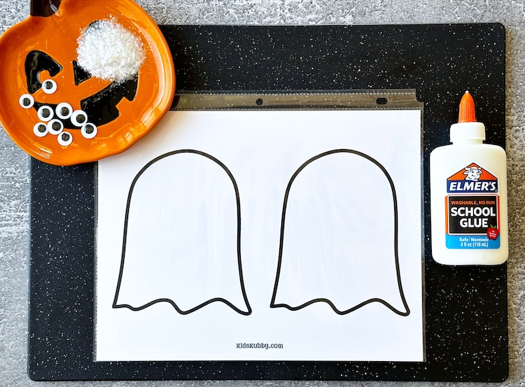 How to make easy homemade window clings for Halloween. Spooky glue ghosts are fun to make with just a few cheap supplies you already have at home. 