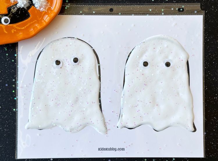 Are you looking for a fun Halloween craft idea? Spooky glue ghosts are not only easy to make but they are so cute to hang around your house! Try this dollar store craft idea for kids today!