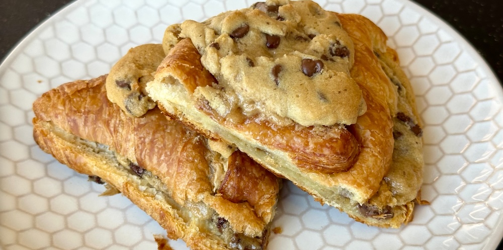 This is the best sweet treat I've ever made! chocolate chip cookie dough on top of flaky butter croissants. What could be better! this simple to make dessert will be a hit with your whole family. And this recipe is perfect to make with your kids.