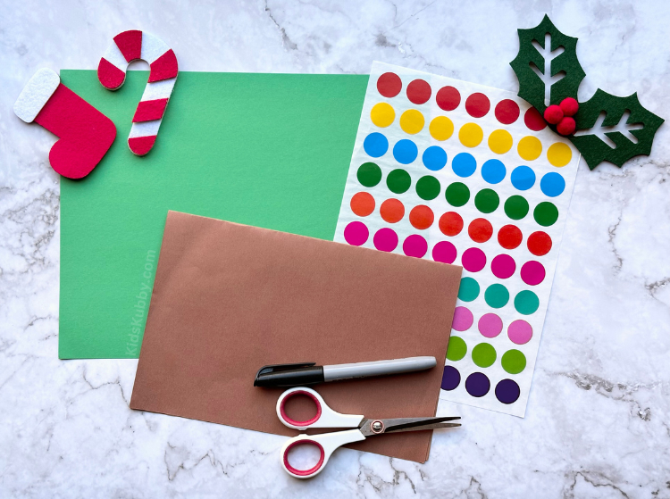 Make the best Christmas themed counting activity for kids using construction paper and dot stickers. This simple to make activity is the perfect way to help kids learn to count. 