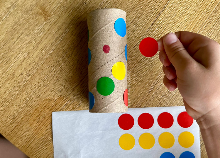 How to make the best color recognition game for toddlers using recycled craft supplies. Toilet paper roll crafts for kids.