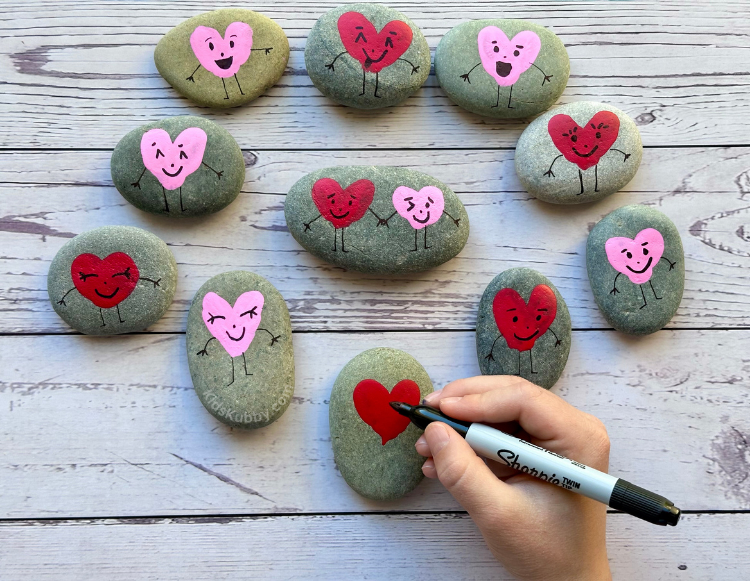 How adorable are these fun fingerprint heart rocks! My kids made these for Valentine's Day gifts for class and it was the cutest thing ever. The perfect homemade Valentine's for everyone in your life.  