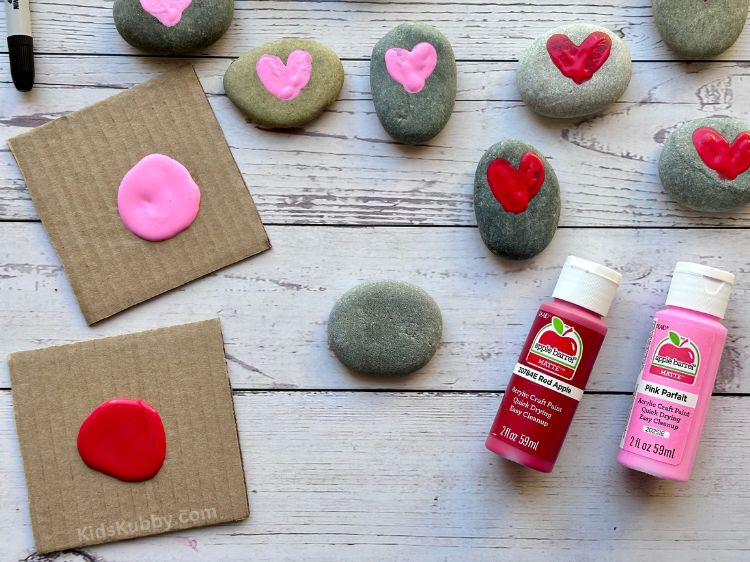 If you're looking for a fun and easy art project for kids, painted fingerprint heart rocks are perfect! You just need rocks, paint, and a marker to make the cutest painted rocks ever. These are perfect for Valentine's Day gifts and decorations. 