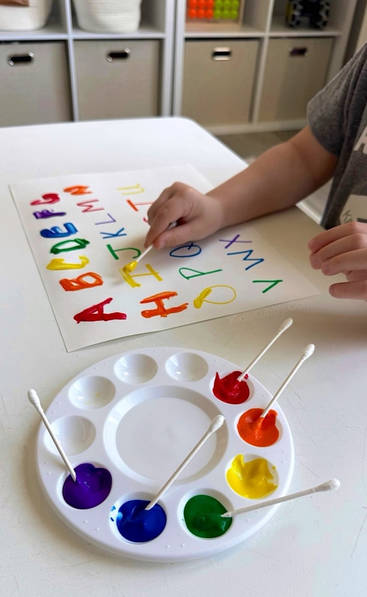 Letter recognition activity for preschoolers using q tips and paint! This cheap and easy art project is perfect for 3 and 4 year olds who are getting ready to start kindergarten. You just need paper, washable paint, and cotton swabs. 