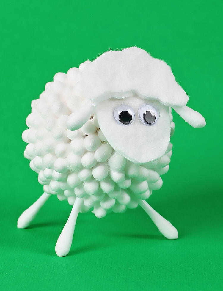 How to make an adorable spring time craft with q tips to create little fluffy sheep. 